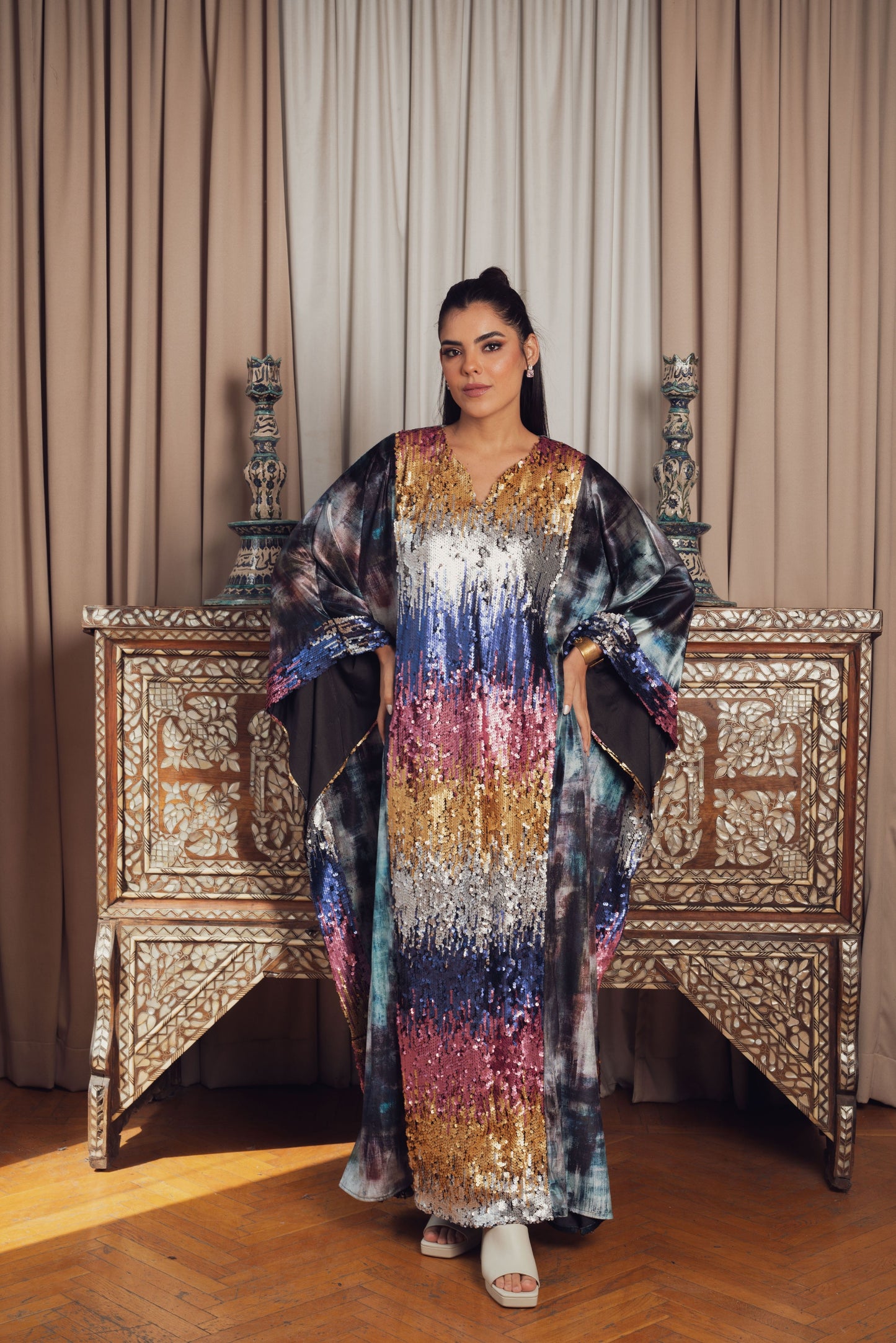 A dazzling kaftan adorned with multicolored sequin