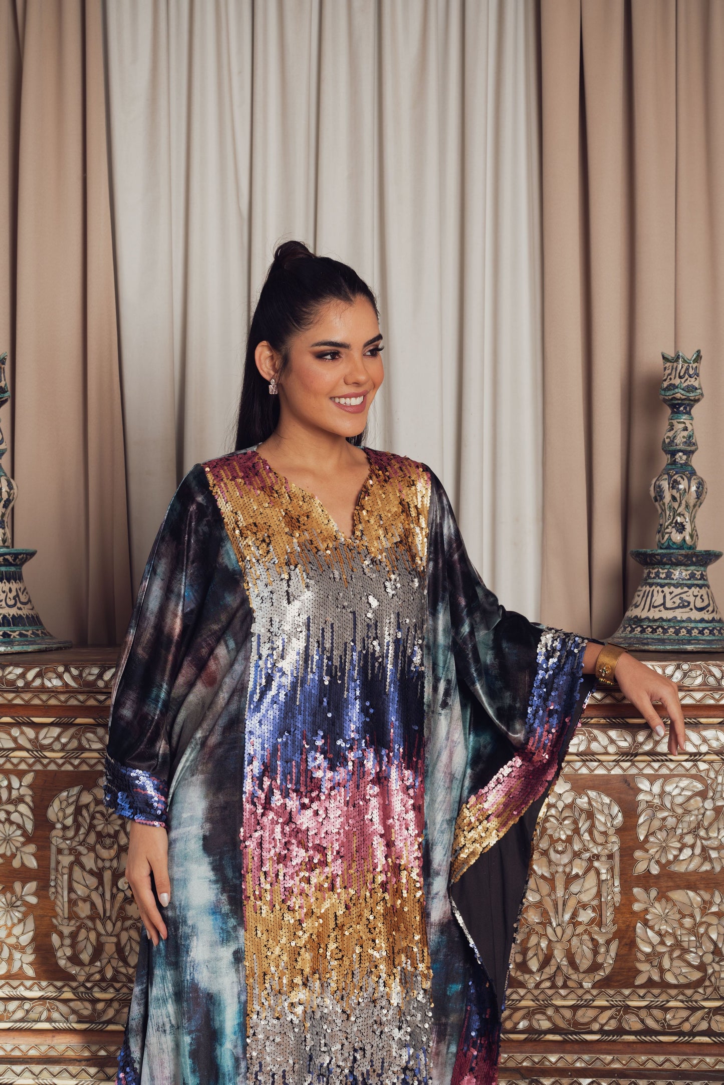 A dazzling kaftan adorned with multicolored sequin