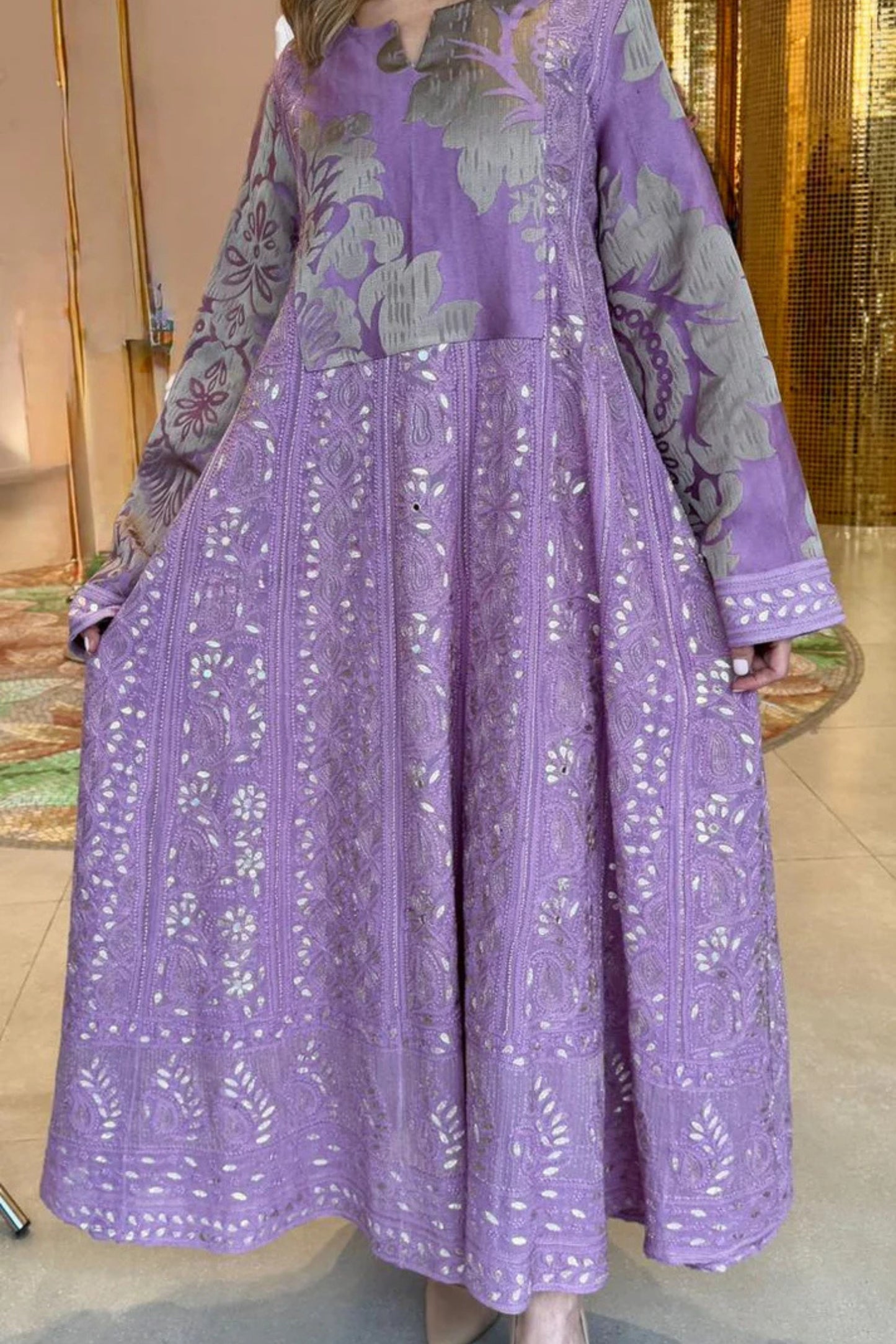 Embracing elegance in intricate lilac hues.