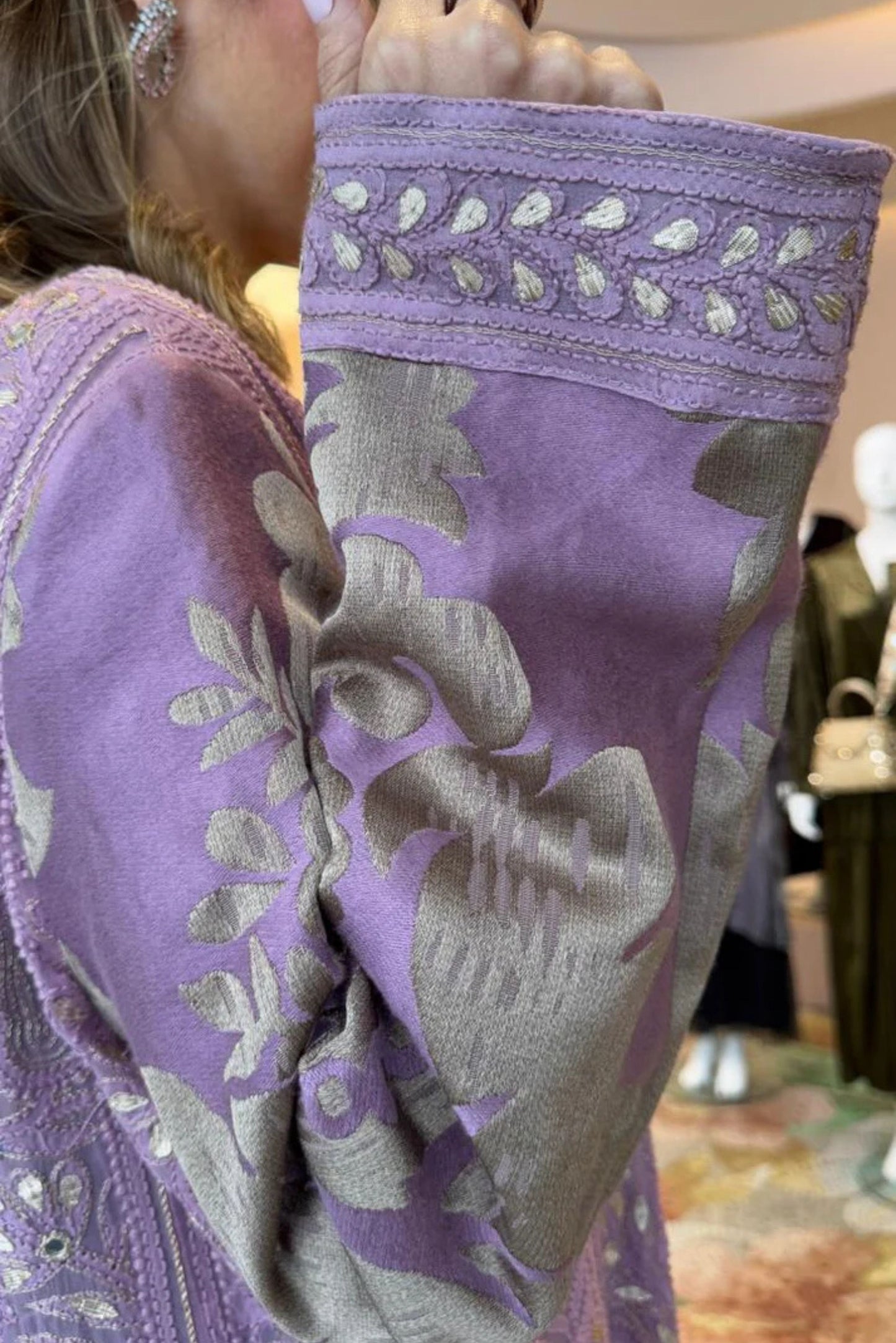 Embracing elegance in intricate lilac hues.