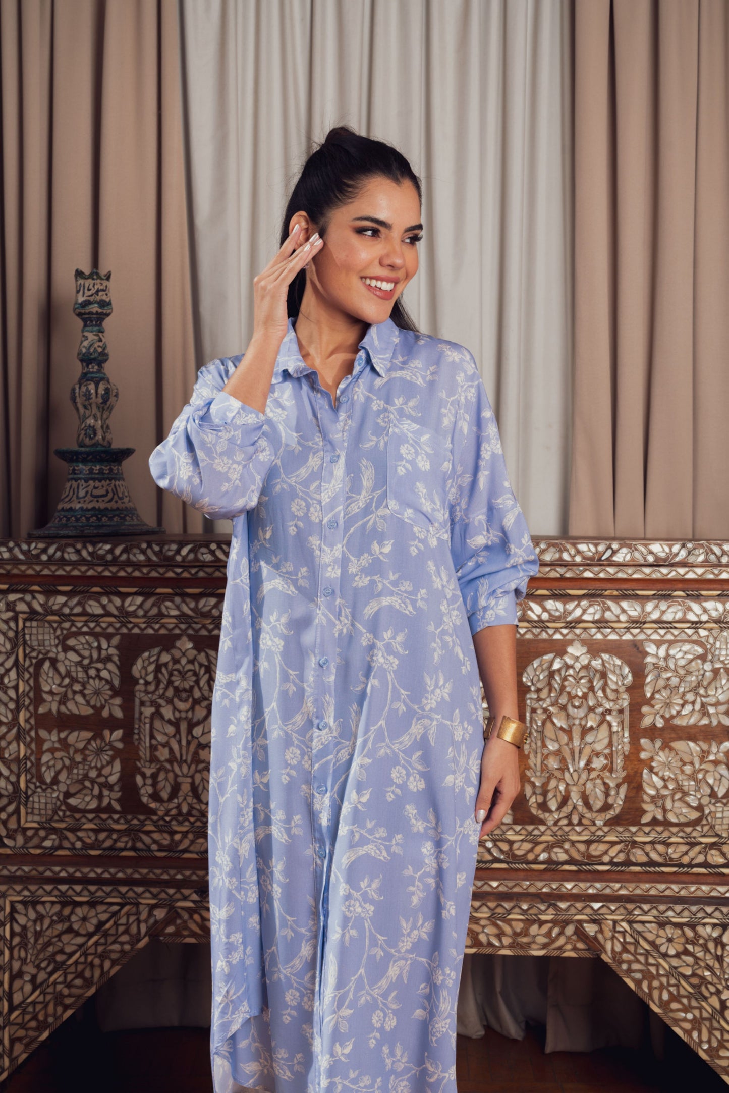 A relaxed yet stylish light blue shirt dress