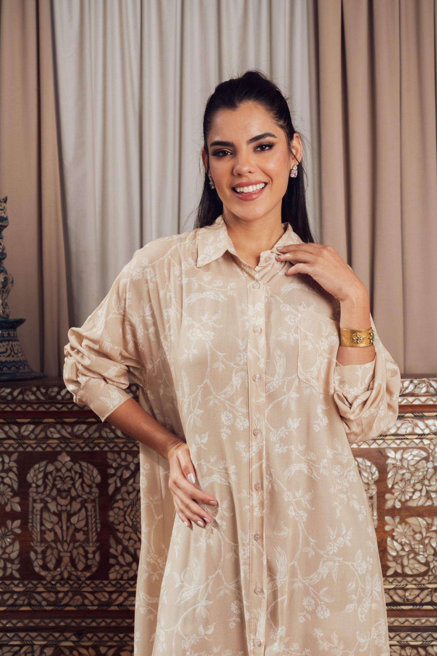 A relaxed yet stylish light beige shirt dress