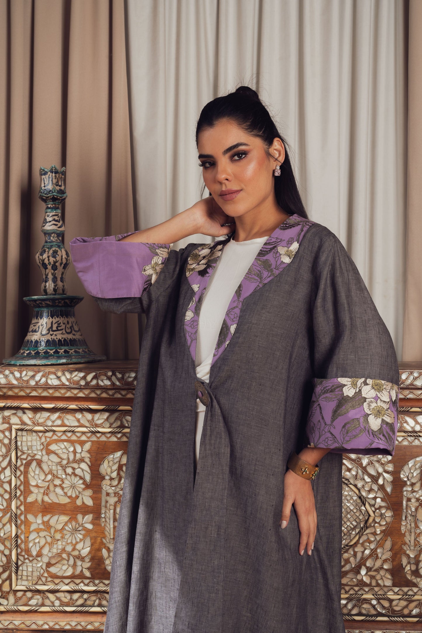 A sophisticated gray abaya with delicate purple floral