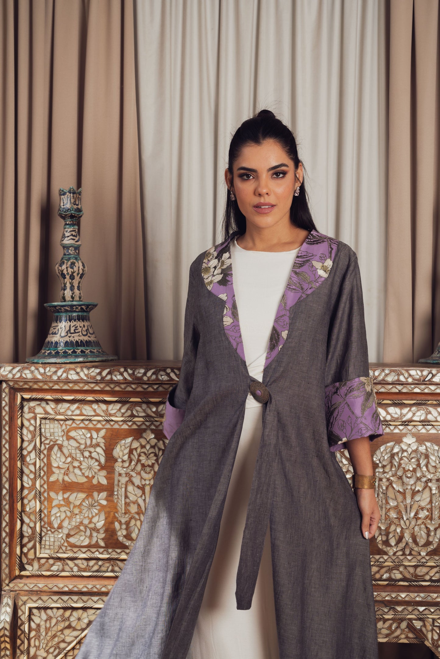 A sophisticated gray abaya with delicate purple floral