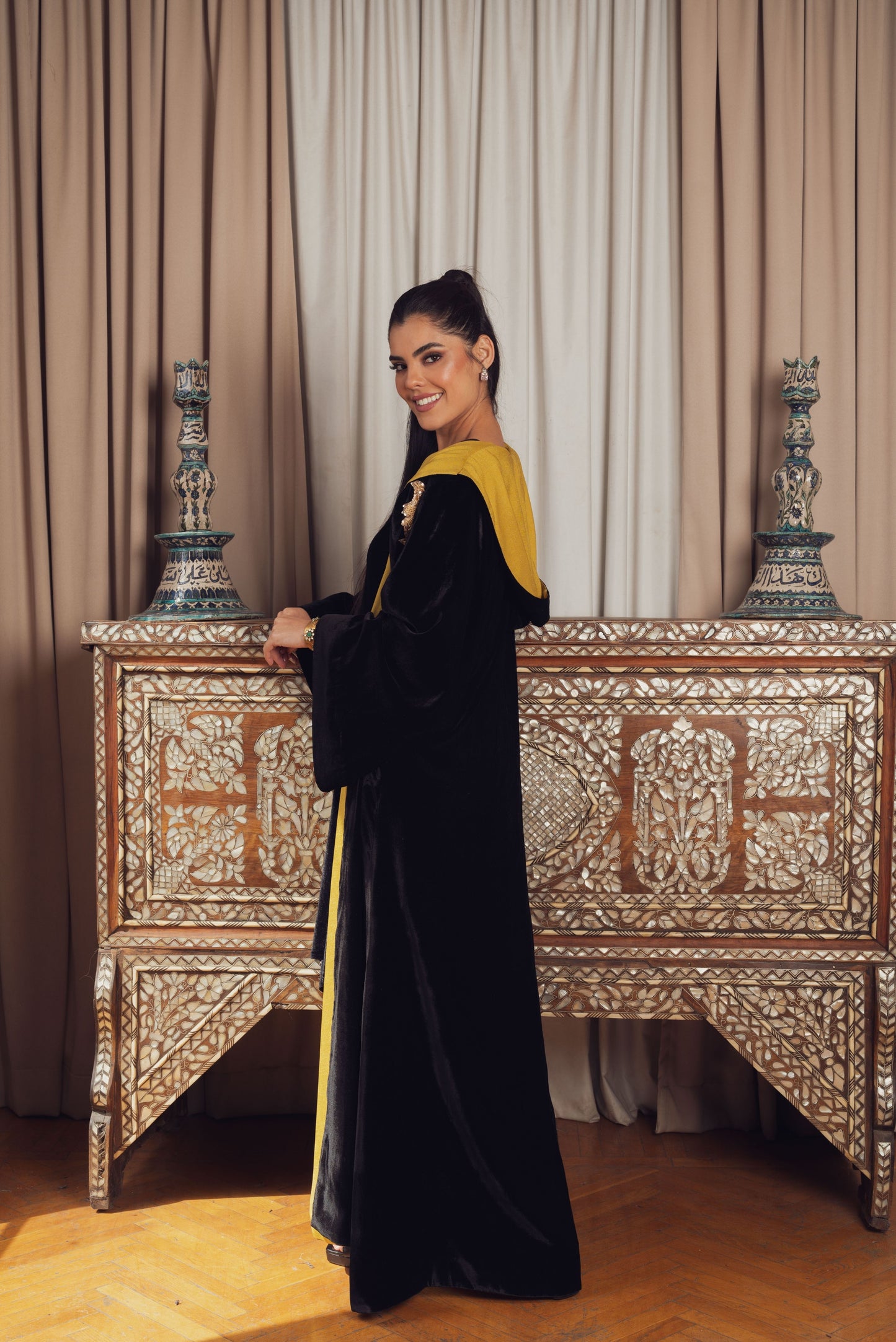 An elegant black velvet abaya