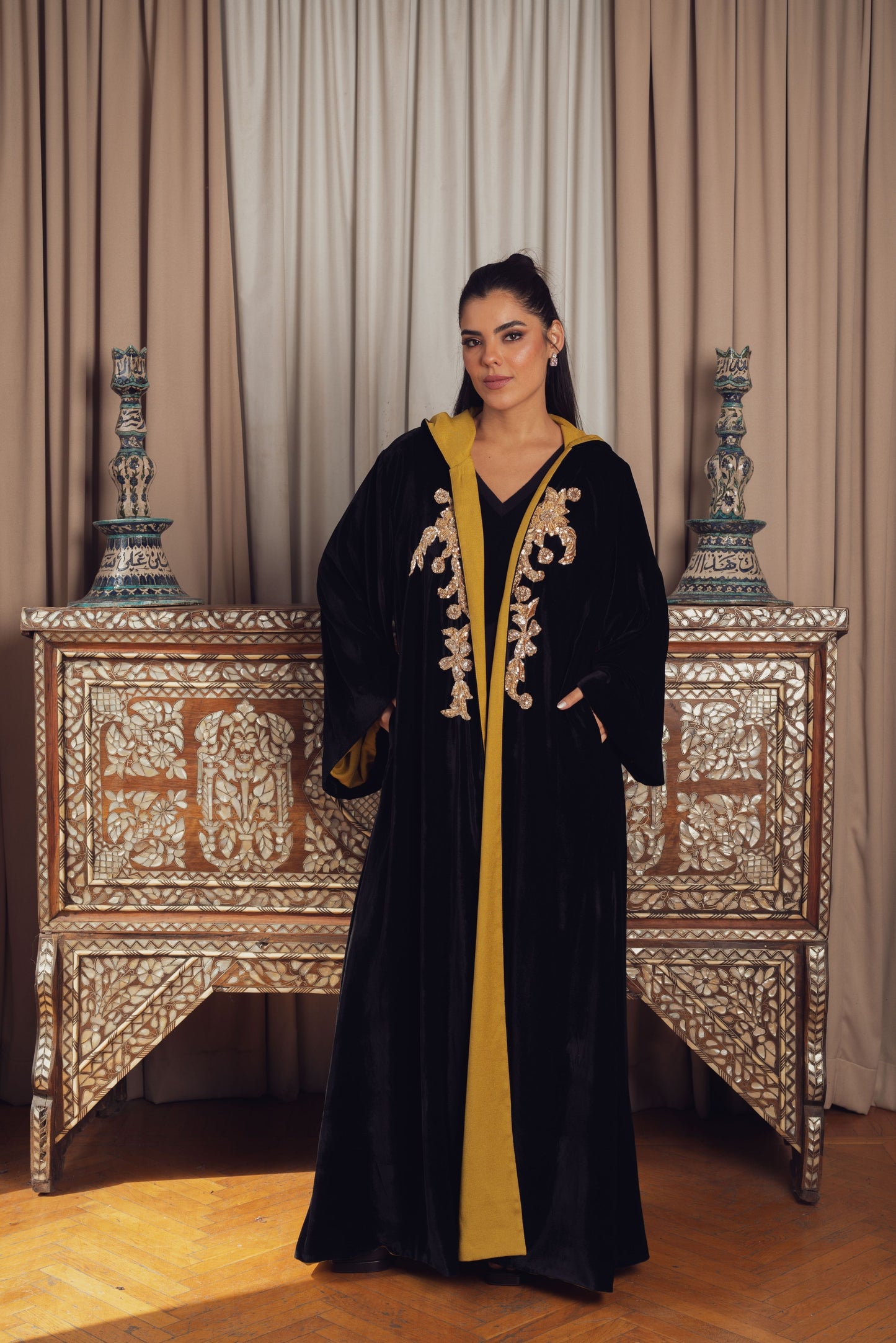 An elegant black velvet abaya