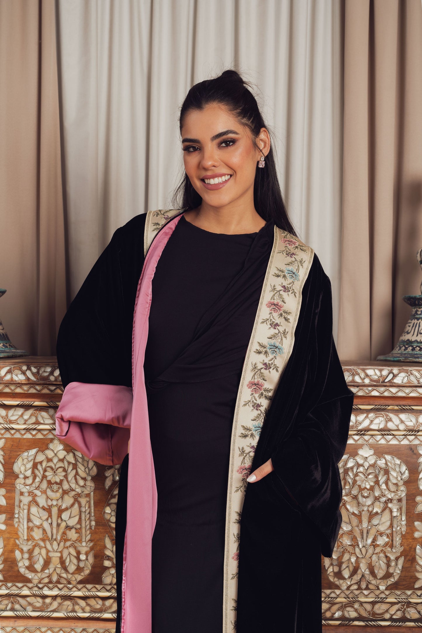The deep black of this kimono provides the perfect backdrop for the vibrant