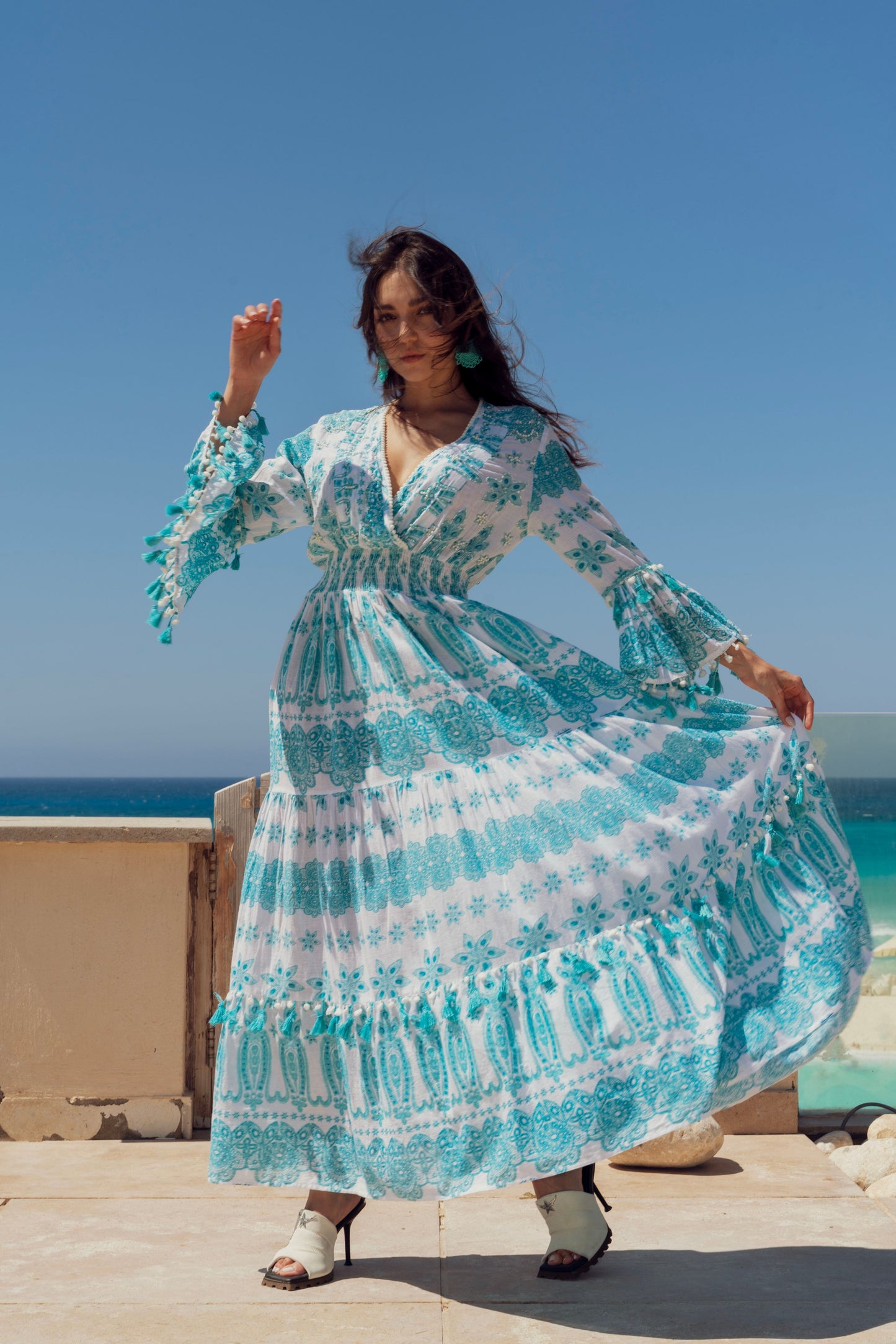 Blue dress with white print.