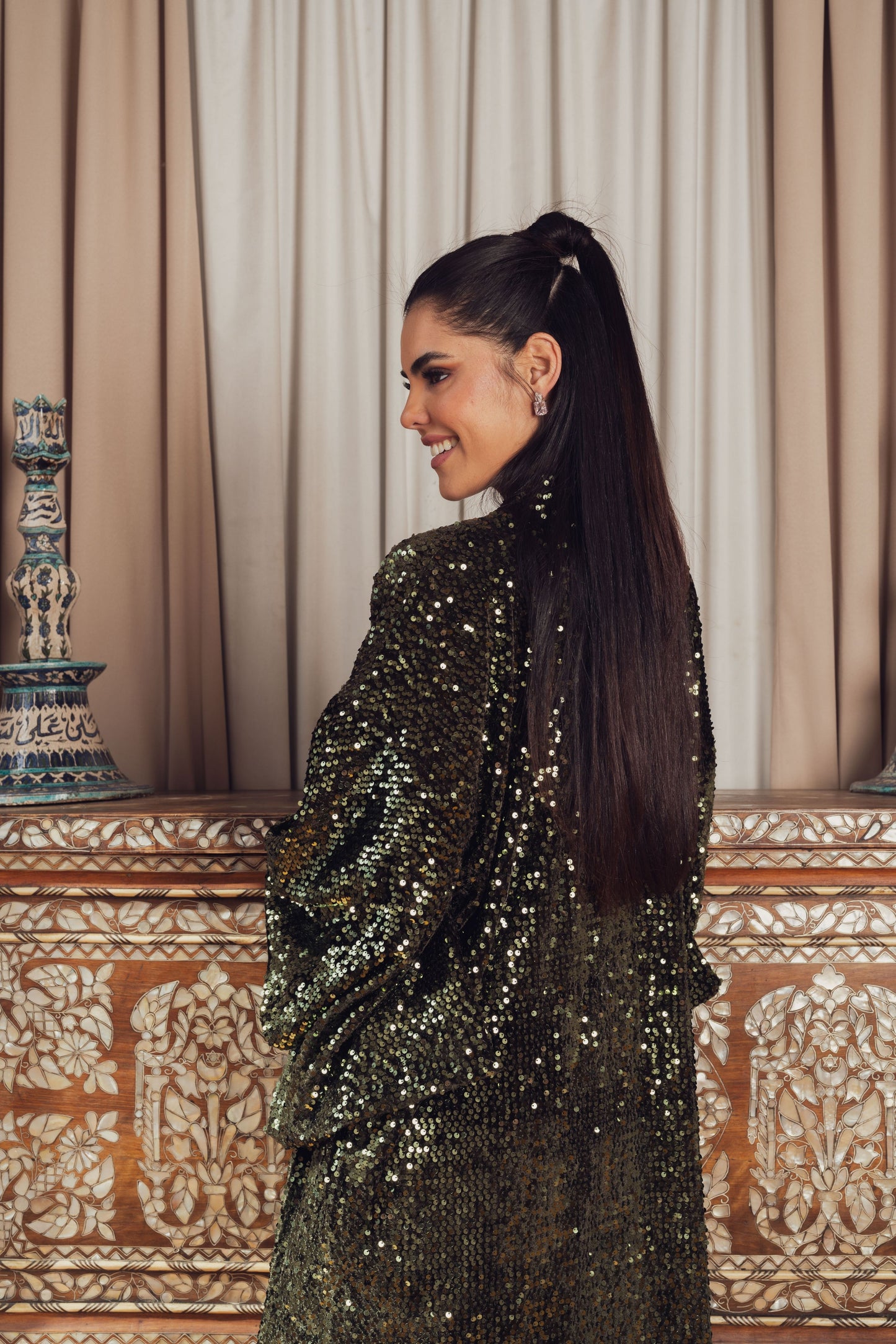 A glamorous dark green sequined kimono