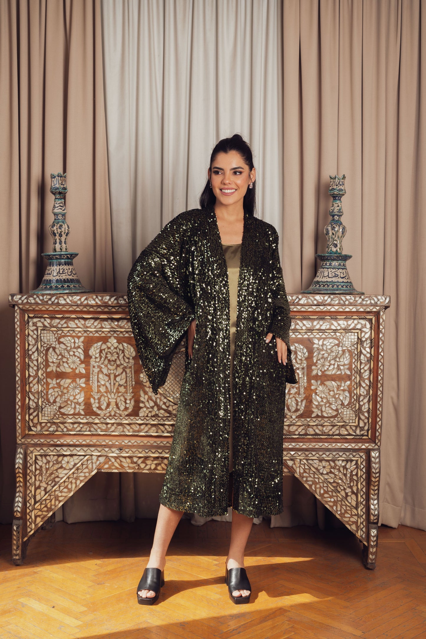 A glamorous dark green sequined kimono
