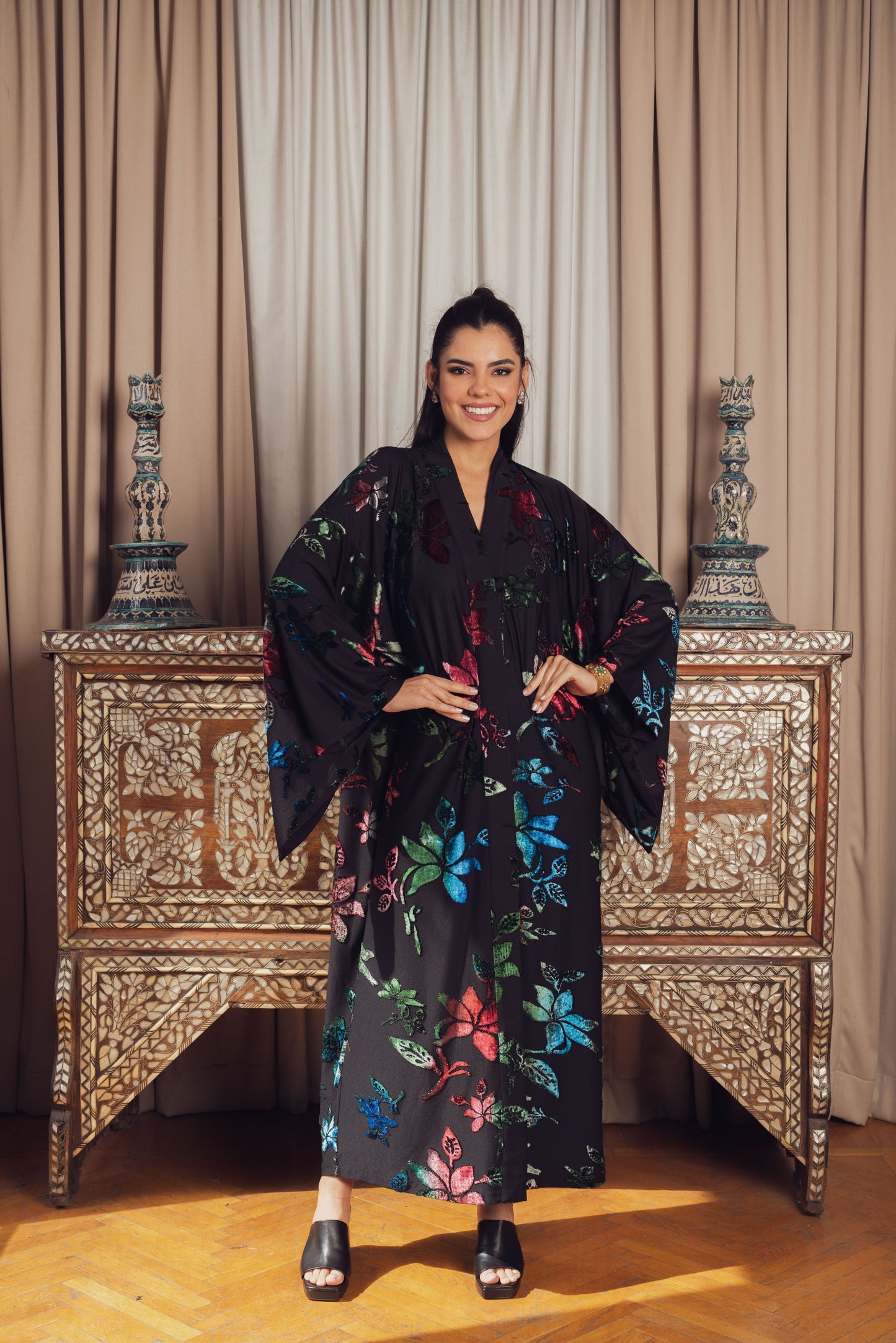 Dramatic florals meet luxurious velvet in this statement kimono.