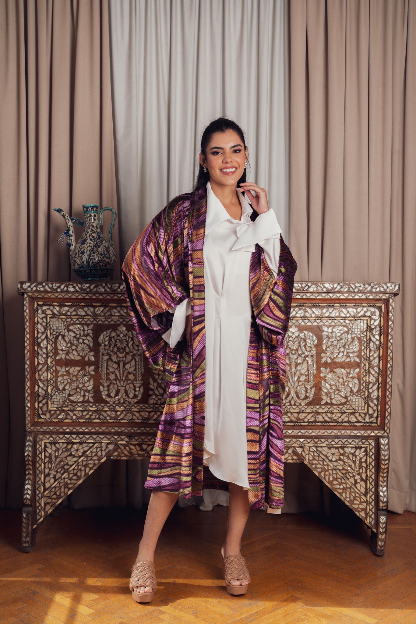 kimono with bold purple, pink, and gold patterns