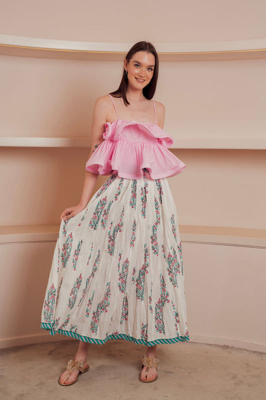 white flowy maxi skirt with a floral print