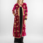 A rich fuchsia velvet kaftan adorned