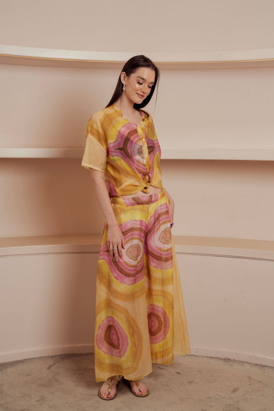 wide-leg pants with a colorful, abstract print