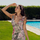 Long dress with floral prints.