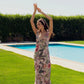 Long dress with floral prints.