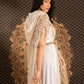 An elegant white and gold embroidered kaftan with a hood