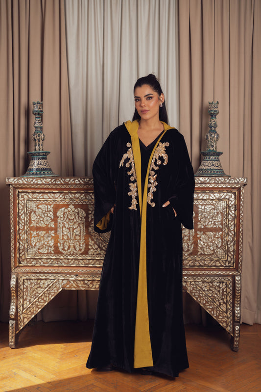 An elegant black velvet abaya
