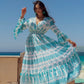 Blue dress with white print.