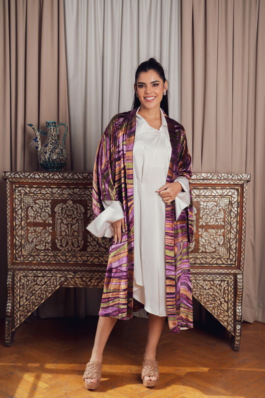 kimono with bold purple, pink, and gold patterns